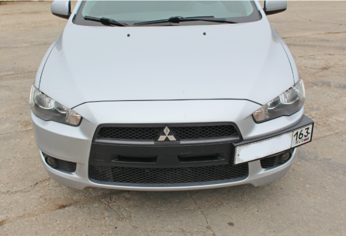 Рамка под номер на передний бампер для Mitsubishi Lancer X (2007-2016) купить недорого с доставкой в Нягань